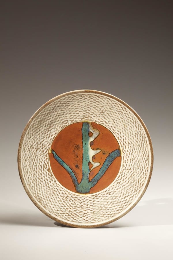 Shimaoka Tatsuzô (1919 - 2007) Round platter with slip-filled, cord-impressed pattern and floral design on iron glaze ground, 1972 Stoneware with iron glazes and turquoise-green glaze Inv# 6363 SOLD
