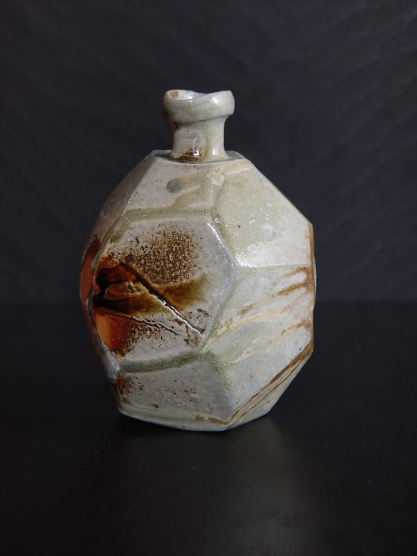 Faceted Tanba tokkuri (sake flask) with light-colored natural ash glaze, 2011 Wood-fired stoneware with natural ash glaze and kiln effects 6 x 4 1/2 inches; Inv# 6935 SOLD