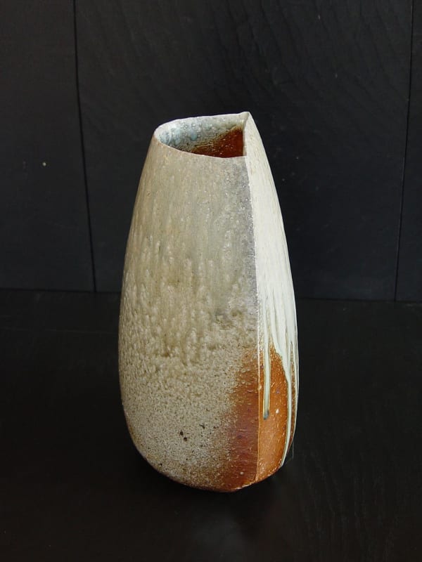 Tilting Tanba vase with moon-shaped opening and natural dripping ash glaze; 2011 Wood-fired stoneware with ash glaze 12 x 6 7/5 x 6 1/4 inches; Inv# 6930 SOLD