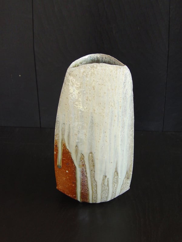Tilting Tanba vase with moon-shaped opening and natural dripping ash glaze; 2011 Wood-fired stoneware with ash glaze 12 x 6 7/5 x 6 1/4 inches; Inv# 6930 SOLD