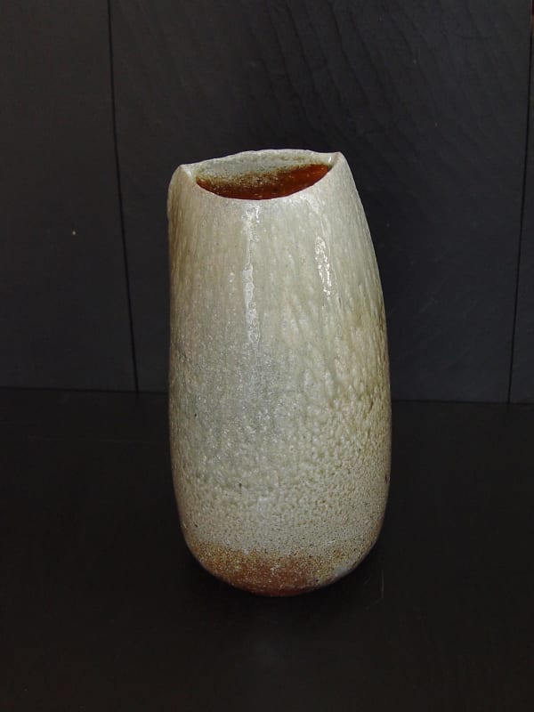 Tilting Tanba vase with moon-shaped opening and natural dripping ash glaze; 2011 Wood-fired stoneware with ash glaze 12 x 6 7/5 x 6 1/4 inches; Inv# 6930 SOLD