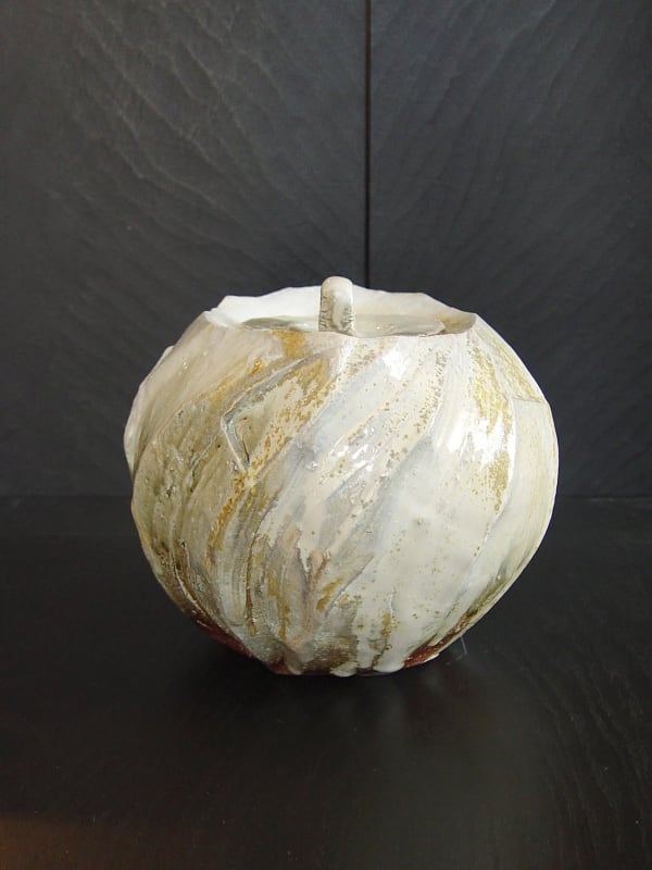 Round covered Tanba water storage jar with ash glaze covering diagonal banding; 2011 Wood-fired stoneware with ash glaze 7 5/8 x 10 3/8 x 8 7/8 inches; Inv# 6925 SOLD