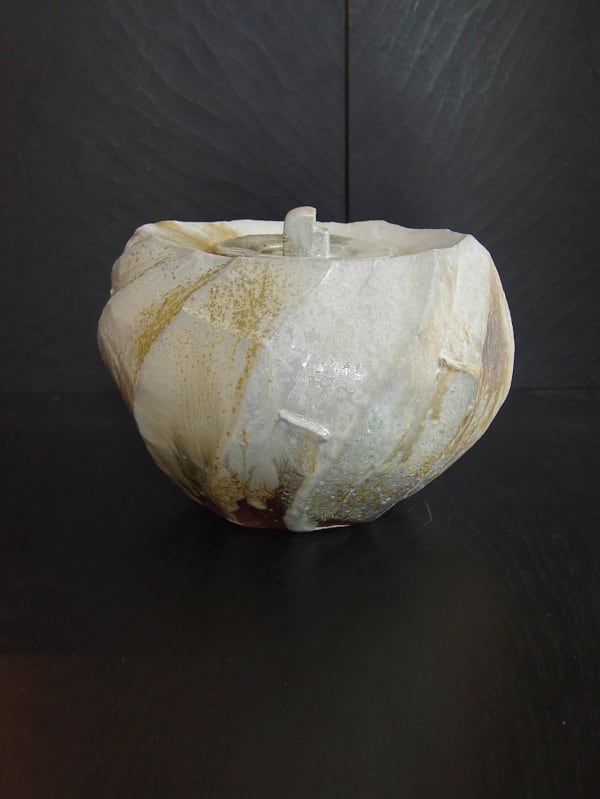 Round covered Tanba water storage jar with ash glaze covering diagonal banding; 2011 Wood-fired stoneware with ash glaze 7 5/8 x 10 3/8 x 8 7/8 inches; Inv# 6925 SOLD