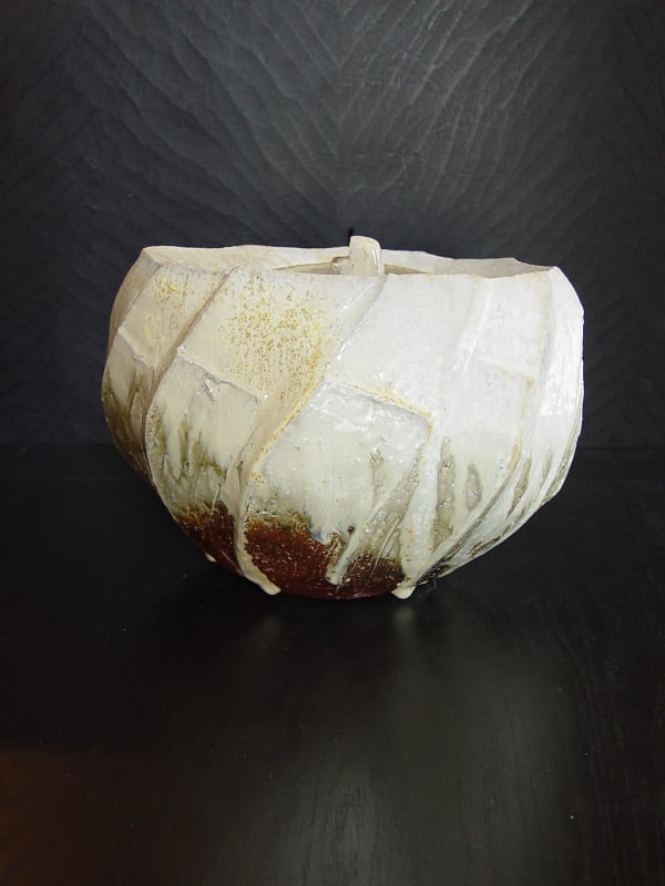 Oval covered Tanba water storage jar with ash glaze covering diagonal banding, 2011 Wood-fired stoneware with ash glaze 7 5/8 x 9 x 10 3/4 inches; Inv# 6924 SOLD