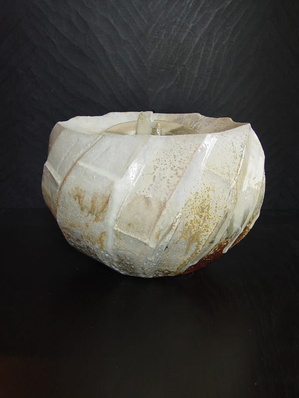 Oval covered Tanba water storage jar with ash glaze covering diagonal banding, 2011 Wood-fired stoneware with ash glaze 7 5/8 x 9 x 10 3/4 inches; Inv# 6924 SOLD