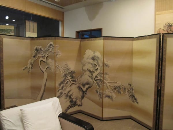 KAWABATA GYOKUSHÔ (1842-1913) Pair of screens depicting snow on pine trees, ca. 1900 ink and gold on paper 72 x 147 1/2 inches each with mount ; 67 3/4x 140 1/2 inches paintings only Inv# 7184 SOLD