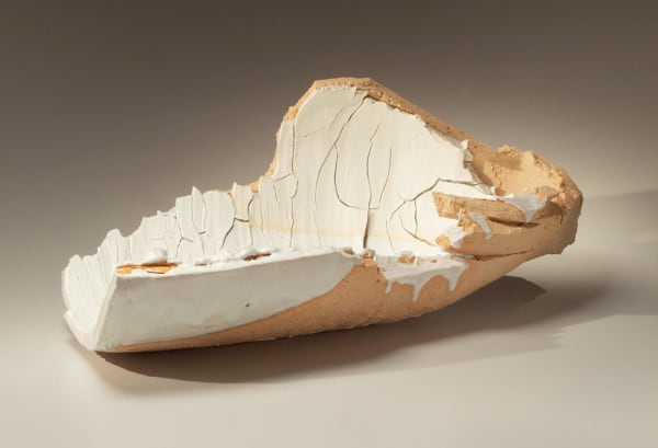 OGAWA MACHIKO (b. 1946) Elongated curved platter-like vessel with rough hewn edges and cracked surface Layers of porcelain and stoneware clays and some white glaze 9 1/2 x 22 x 13 inches Inv# 7327 SOLD