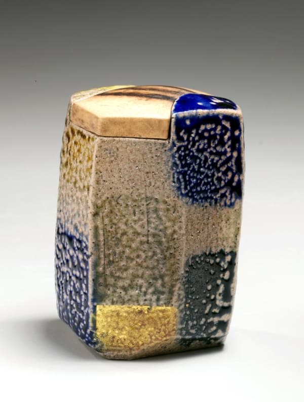 Light brown, blue, olive green and gold-glazed faceted checkerboard basara tea caddy, 2012 Glazed stoneware and wood 3 1/4 x 2 1/2 x 2 1/2 in. Inv# 7963