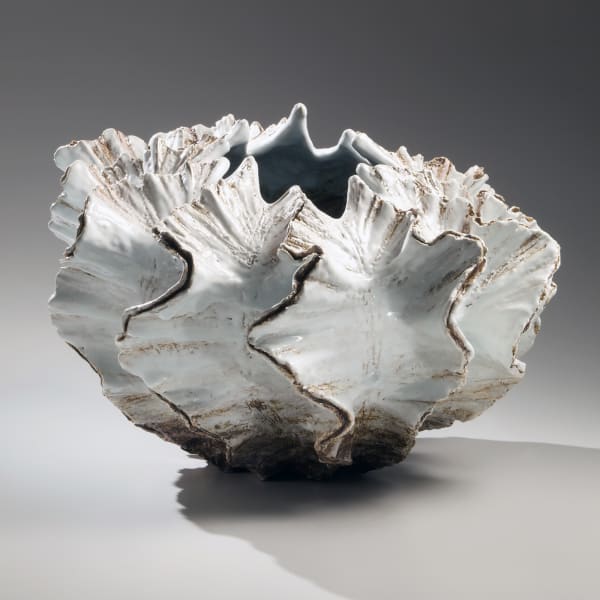 Pleated shell-shaped sculpture with silver glaze along the flaring edges, turquoise and white glazed interior and narrow mouth 2012 Glazed stoneware with silver glaze 13 3/8 x 19 5/8 x 19 5/8 in. Inv# 8175