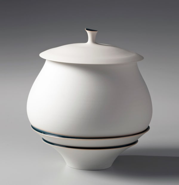 Unglazed mizusashi (water jar) held together by bands of blue glaze and underside of lid in silver 2014 Unglazed porcelain with blue glaze and silver leaf 8 1/4 x 8 5/8 x 8 5/8 in. Inv# 8566