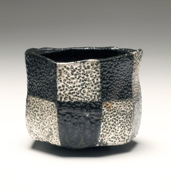 Ajiki Hiro (b. 1948) Basara faceted teabowl with checkerboard patterning in black and silver glazes, 2012 Salt-glazed stoneware 4 x 4 3/4 in. Inv# 8042