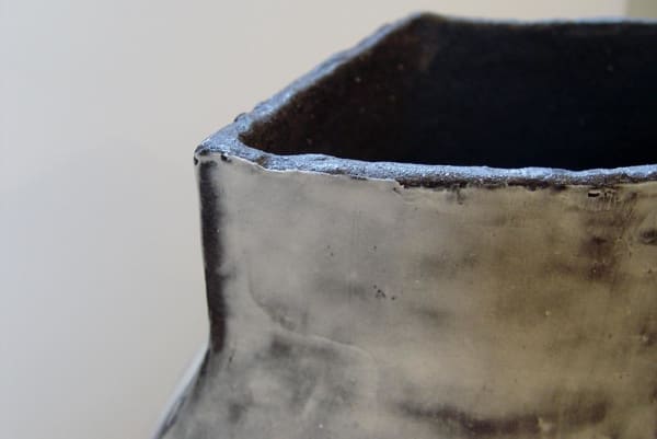 Miyashita Hideko (b. 1944) Four-sided flattened baluster-shaped vessel with brush-applied and tape-masked white slip in checkerboard patterning with translucent overglaze, 2013 Dark gray stoneware with clay-slip and translucent overglaze 15 1/2 x 13 1/8 x 8 1/8 in. Inv# 8514