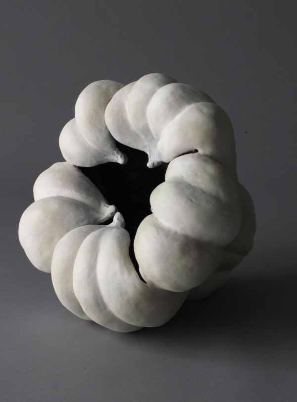 Sculpture in the form of a pumpkin with matte glazes in white 2014 Stoneware with colored slip glaze 12 x 12 x 13 1/2 inches Inv# 9093 SOLD