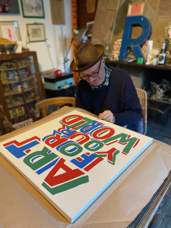 Artist Bob and Roberta Smith with his speically commissioned limited edition print for Art For Your World.
