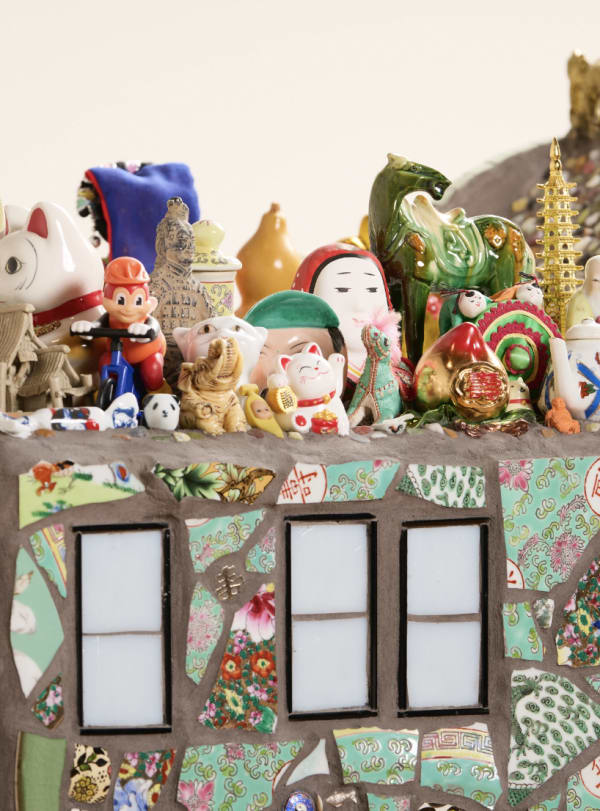 Stephanie H. Shih, Toy Building (Dream House), 2025, Chinese export porcelain, crowdsourced and found objects, archaeological ceramic fragments from a Chinese fishing village on Monterey Bay (c. 1850–1906), stained glass, polished stones, ceramic, glass rods, resin, enamel, and grout on ferrocement, polystyrene, and steel 51 x 25 x 45 inches. Collection of John Michael Kohler Arts Center, Sheboygan, WI.