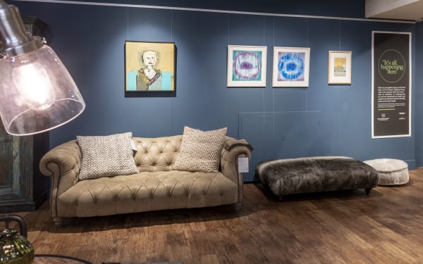 Paintings (left to right) Lady in a Cloak by John Kiki, Mystery Henge 1 and 3 by Linda Jamieson and...