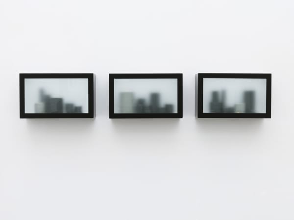 Edmund DE WAAL (b. 1964) Reading at Night 1-3, 2011 A series of 3 sprayed black aluminum cabinets each containing thrown porcelain vessels in varying glazes and covered in opaque glass Cabinets each 10 ¼ x 16 ¾ x 6 ¼ inches / 26 x 42.5 x 16 cm