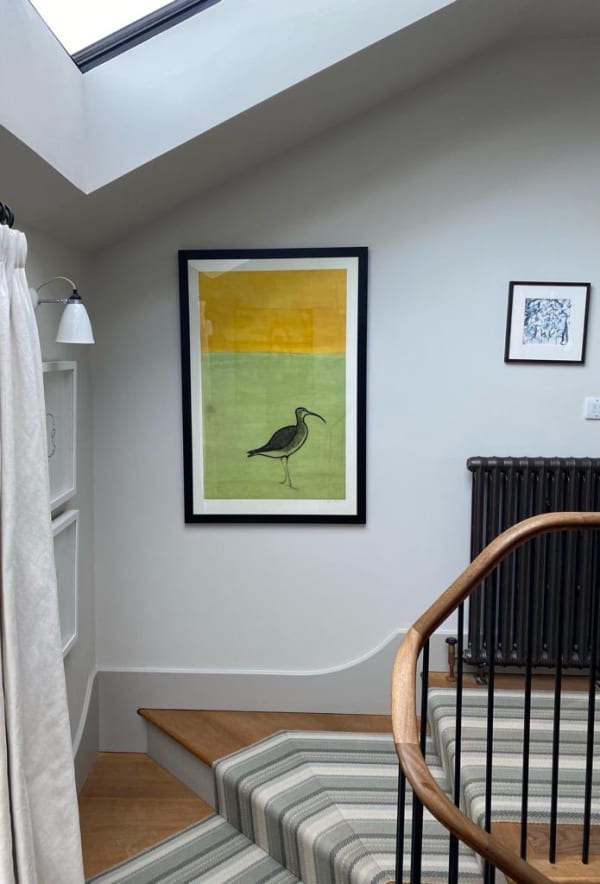 Kate Boxer drypoint 'Curlew' above a staircase.