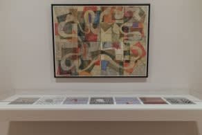 Steven Ford’s Untitled unique linocut hangs above Tom Nozkowski’s suite of etchings