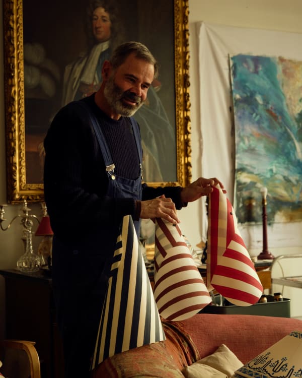 A newer silhouette is a wrapped cylindrical style painted in signature stripes, which will hang from the ceiling.