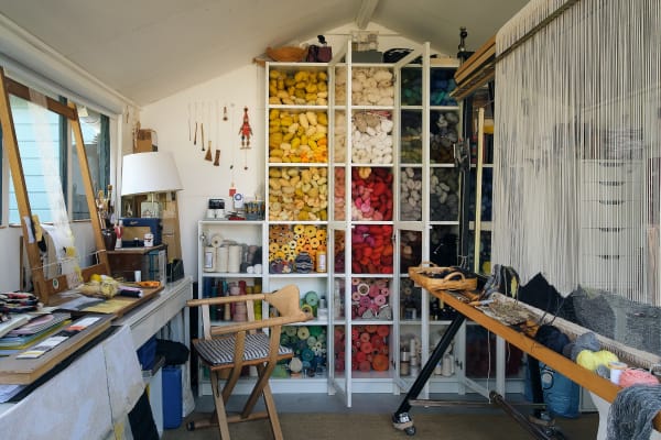 "I’m sat facing the books, handy if I want to look up something, but I can do the small pieces looking out on the garden."