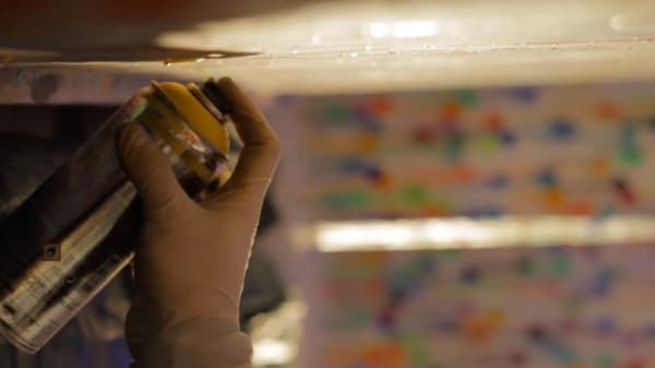 ELO painting his mural at the nightclub WIP