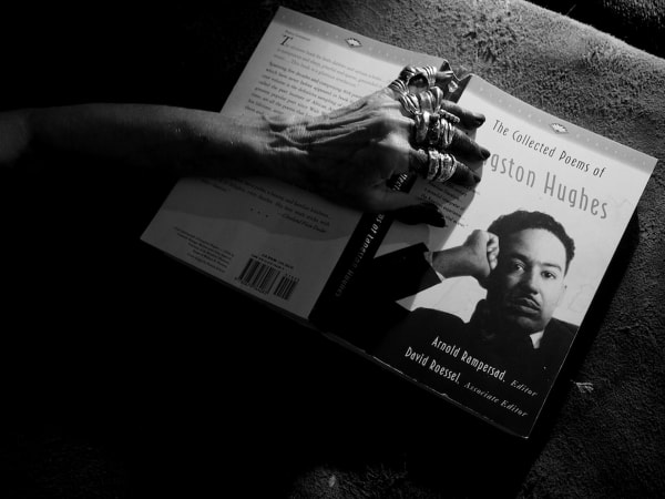 Caecilia Tripp, Sleeping with Books, (Langston Hughes), 2011 - ongoing Diasec, 120 x 170 cm, B&W Courtesy of the artist & Erna Hecey Gallery