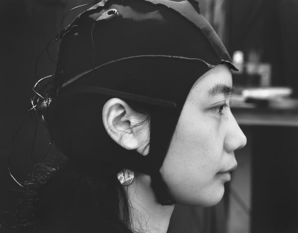 Jeff Weber, Untitled (Furen Dai with a wearable EEG headset), 2024, silver gelatin print, 5x7”