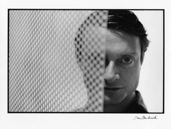 Dan Budnik, Roy Lichtenstein behind Benday screen, West 20th Street Studio, New York, 1964