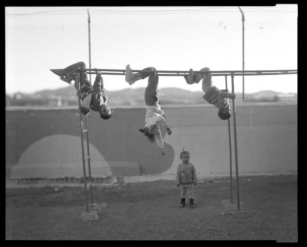 Lisa Elmaleh, Playing on the playground, House of Mercy, Nogales, Sonora, Mexico; Jugando en el patio de recreo, Casa de la Misericordia, Nogales, Sonora, México, 2024