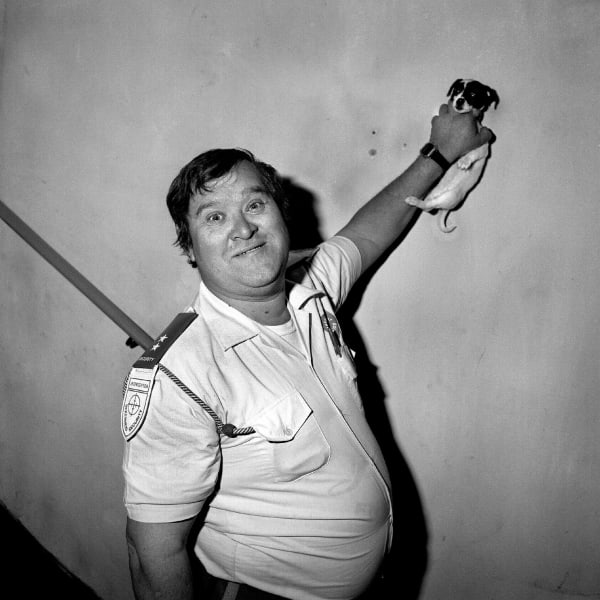 Roger Ballen, Security Guard and Puppy on Staircase, 1997