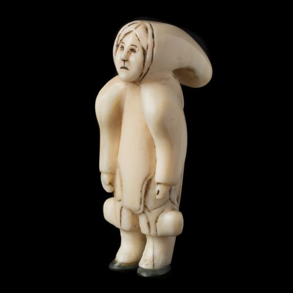 UNIDENTIFIED, IGLOOLIK Woman in her Amautiq, Leggings, and Boots, c. 1890-1920 REALIZED: $2,880