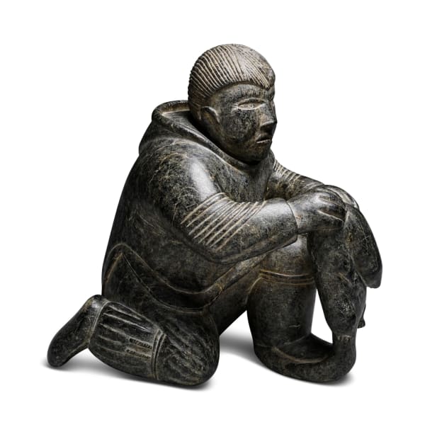 LOT 5 TIMOTHY QUANANAAPIK (1938-1984) PUVIRNITUQ (POVUNGNITUK) Hunter with Lemming, 1957 stone, 9 x 8 1/2 x 5 in (22.9 x 21.6 x 12.7 cm) ESTIMATE: $3,500 — $5,000 PRICE REALIZED: $4,500