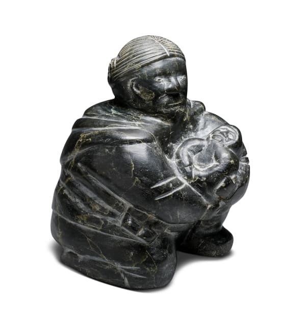 LOT 6 UNIDENTIFIED ARTIST, INUKJUAK (PORT HARRISON) Mother Holding Child, early 1960s stone, 8 x 7 x 5 1/2 in (20.3 x 17.8 x 14 cm) ESTIMATE: $1,000 — $1,500 PRICE REALIZED: $1,320