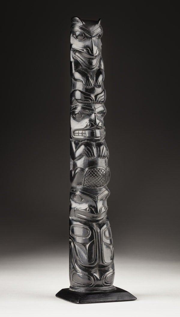 Lot 55 UNIDENTIFIED ARTIST, HAIDA, PROBABLY MASSET, HAIDA GWAII Totem Pole, c. 1900-1910 argillite, 9.5 x 2.5 x 2 in (24.1 x 6.3 x 5.1 cm) Estimate: $1,800 — $2,800 Price realized: $4,560