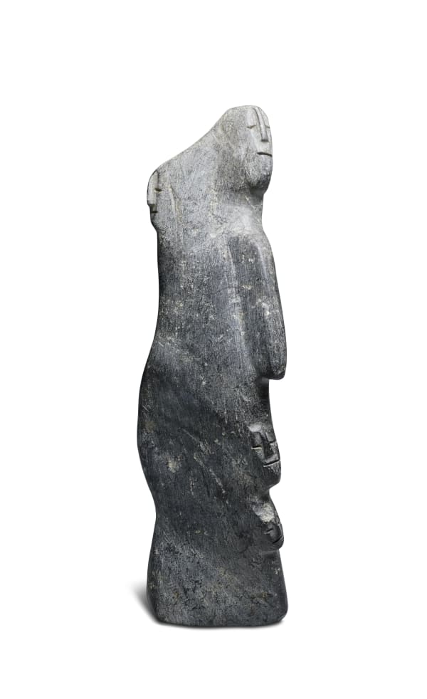 Lot 7A LUCY TASSEOR TUTSWEETOK (1934-2012) ARVIAT (ESKIMO POINT) Family, early 1980s stone, 8 1/4 x 2 1/2 x 3 3/4 in (21 x 6.3 x 9.5 cm) ESTIMATE: $1,000 - $1,500 Price realized: $1,320