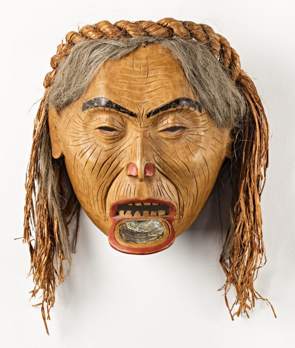 Lot 67 FREDA DIESING (1925-2002), HAIDA, PRINCE RUPERT Old Woman with Labret, 1973 alder, cedar bark, hair, abalone, and paint, 8 x 9 x 6 in (20.3 x 22.9 x 15.2 cm) excluding hair Estimate: $5,000 — $7,000 Price realized: $33,600