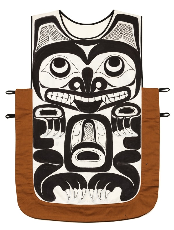 Lot 73 BILL REID, O.B.C., R.C.A. (1920-1998) Painted Canoe Tunic, 1989 pigment on a hand-sewn fabric tunic, 35.25 x 27 in (89.5 x 68.6 cm) Estimate: $10,000 — $15,000 Price realized: $15,600