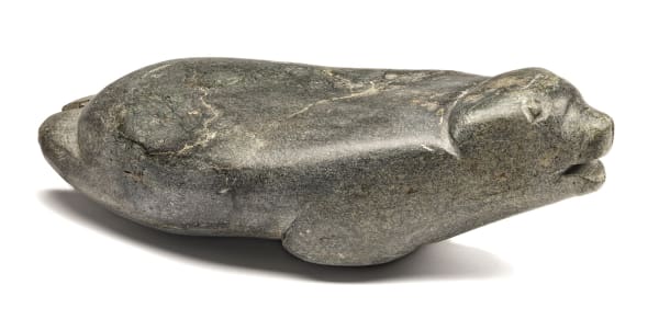 Lot 83 JOHN KAVIK (1897-1993), KANGIQLINIQ (RANKIN INLET) Seal, 1967 stone, 5.25 x 17.25 x 8.5 in (13.3 x 43.8 x 21.6 cm) Estimate: $6,000— $9,000 Price realized: $5,760