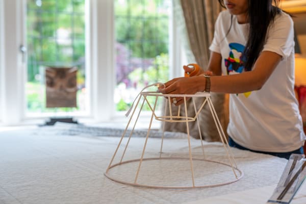 The struts of the frame are bound with a complimentary silk and with Duplex lampshades the inner ring is also covered in silk.