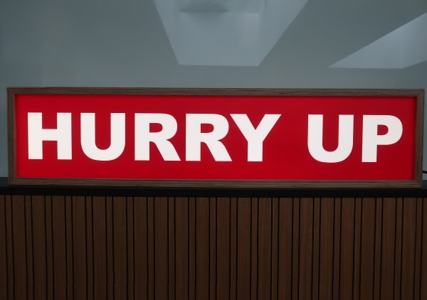 Cornelia Parker, HURRY UP PLEASE IT’S TIME, 2021. LED lightbox, Birch Plywood, Perspex frontage, 100 x 23.5 cm