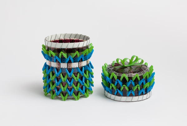 Lid of basket sits next to body.