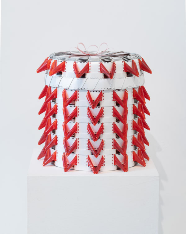 When Will the Red Leader Overshadow Images of the 19th Century Noble Savage in Hollywood Films that Some Think are Sympathetic to American Indians, 2018 35mm film (from "Windwalker," 1981), red and white film leader, silver braid 15 1/2 x 14 x 14 in