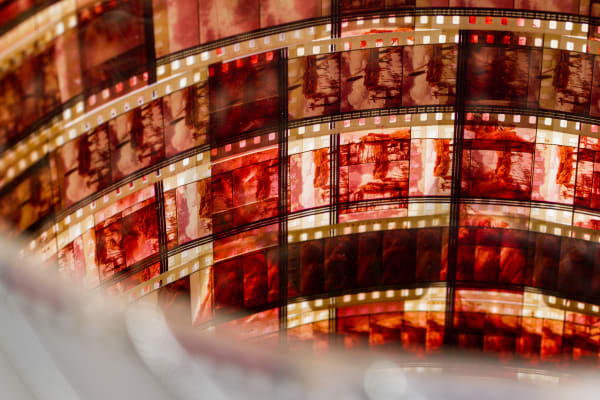Dreaming Indians into an Ethnographic Past, 2021 35mm film (Windwalker, 1980), 35mm white film leader, silver metallic braid, plexiglass tube core 18 1/4 x 15 x 15 in