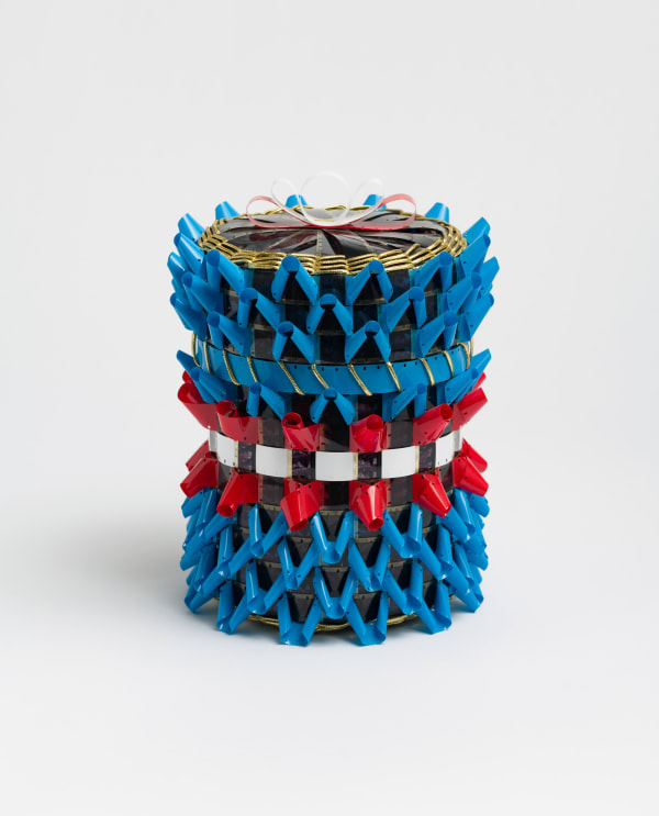 Gail Tremblay Life Along the River, 2013 16mm film (Fishing at the Stone Weir, 1967); blue, red and white 16mm film leader; gold metallic braid 10 1/2 x 7 1/2 x 7 1/2 in