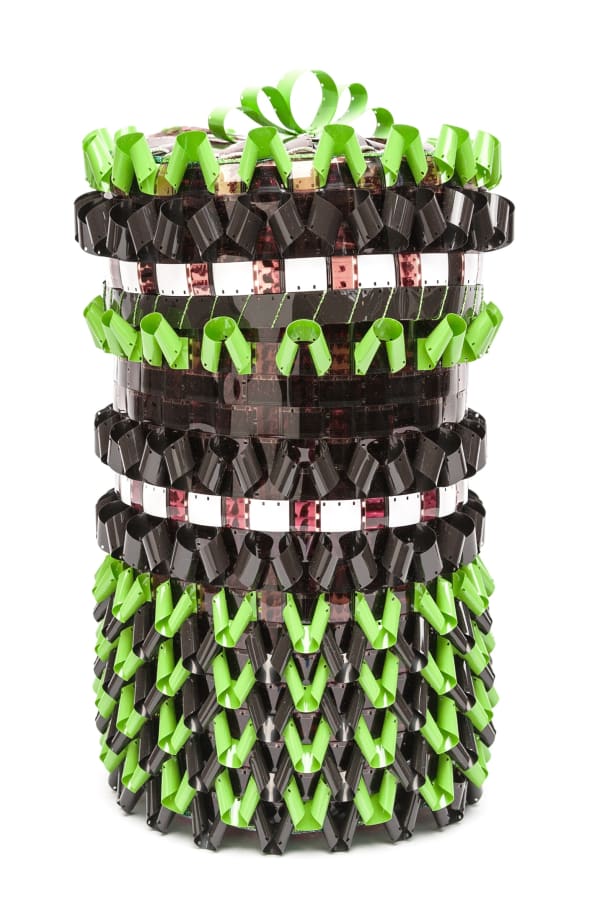Gail Tremblay Reconstructing the Ethnographic Present, 2016 16mm film (At the Winter Sea Ice Camp, Part 1, 1967); green, black and white 16mm film leader; silver metallic braid, green metallic yarn, Scotch brand double-sided tape. 16 1/2 x 10 x 10 in