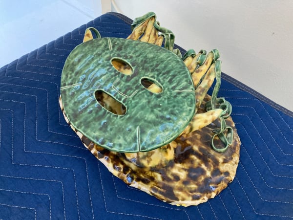 Installation View of American Dream Pillow (Green Beauty Mask) (2020)