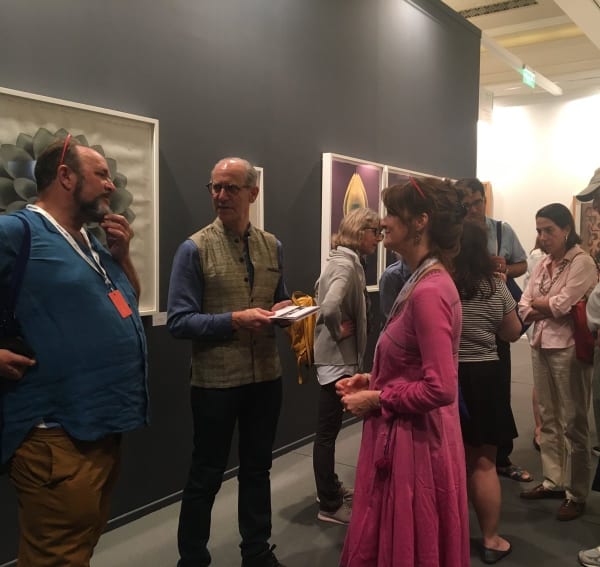 William Dalrymple, Glenn Lowry and Olivia Fraser at the booth