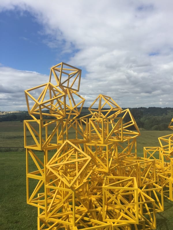 Rasheed Araeen, Zero to Infinity (Sunflower Yellow), outside the Longside Gallery, Yorkshire Sculpture Park