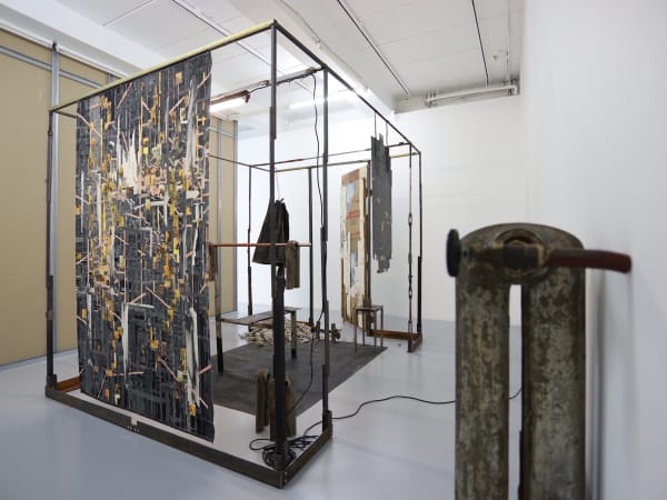 Marcin Dudek Akumulator Installation View Steel Wood Medical Tape Mirror Neon Light Paper Leather Silicon Cell Phone 290X220X220Cm 2013 2018 Detail1